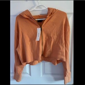 Out from under cropped zip up hoodie